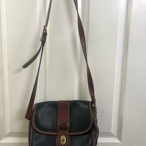 Coach black and brown purse medium. Pocket on back and inside